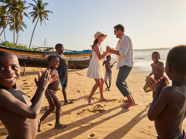 touristes dansant avec des enfants malgaches